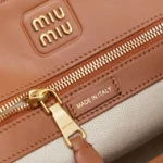 Miu Miu Embossed-Logo Leather Tote Bag