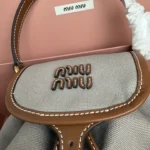 Miu Miu Canvas and Leather Backpack
