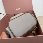 Miu Miu Canvas and Leather Backpack