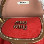 Miu Miu Canvas and Leather Backpack